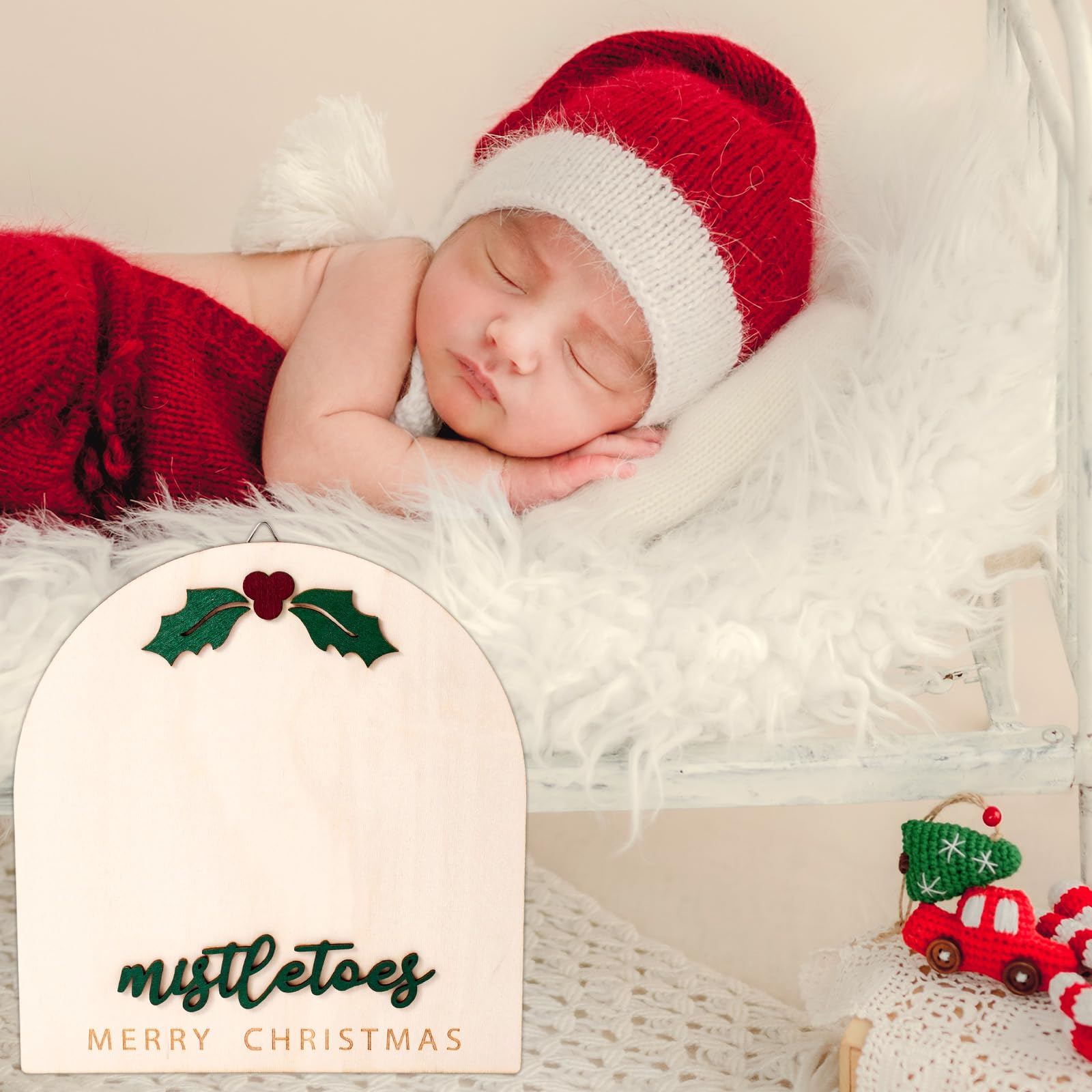 Fukaisu Christmas-themed baby footprint complements cards and wreaths.