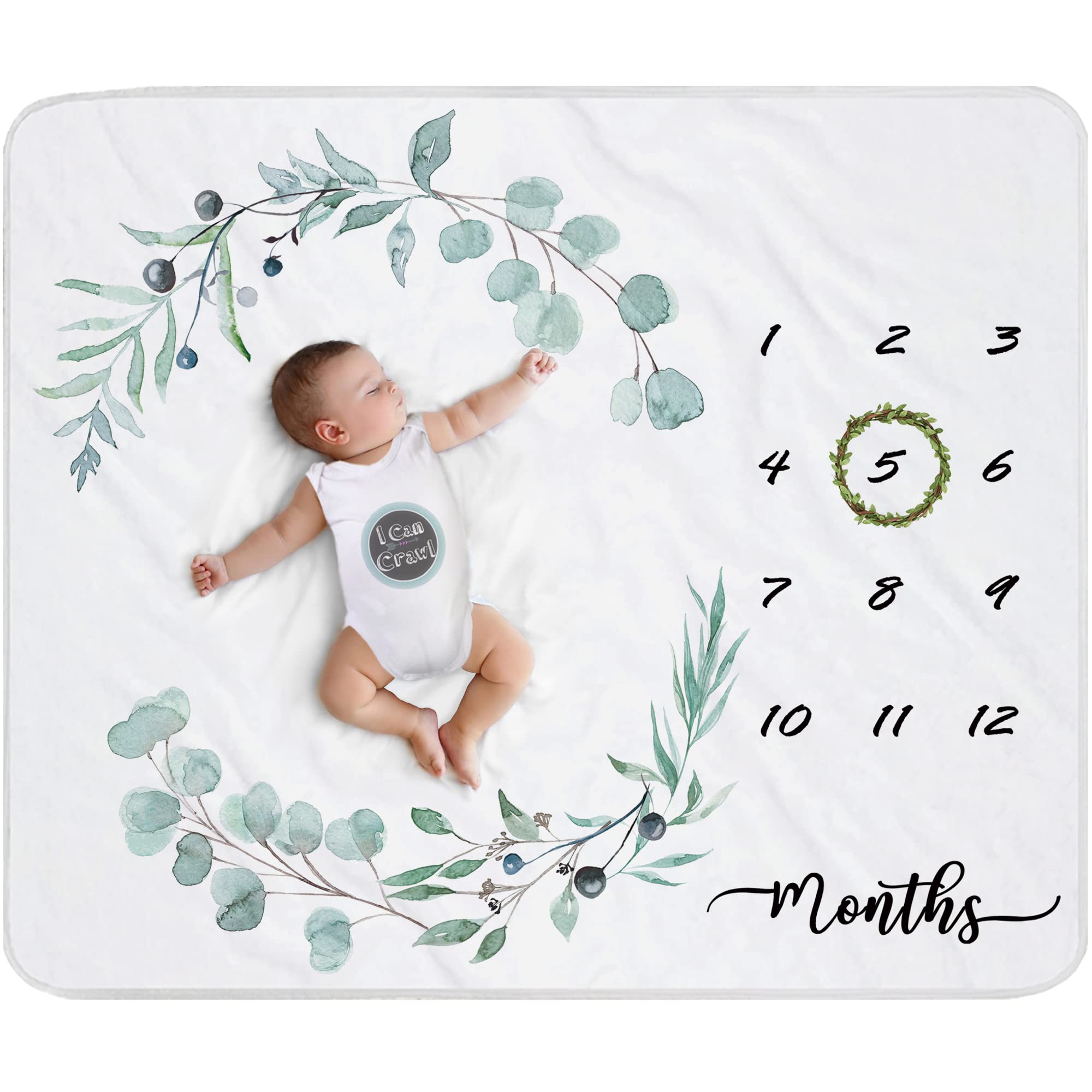 Fundich baby milestone blanket setup with ivy wreath for monthly photos.