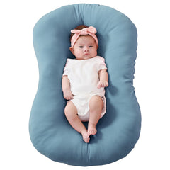 Funupup bamboo lounger cover on Snuggle Me for newborn comfort.