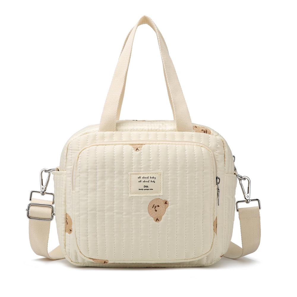 Fwkekye small diaper bag tote with multiple pockets for quick access.
