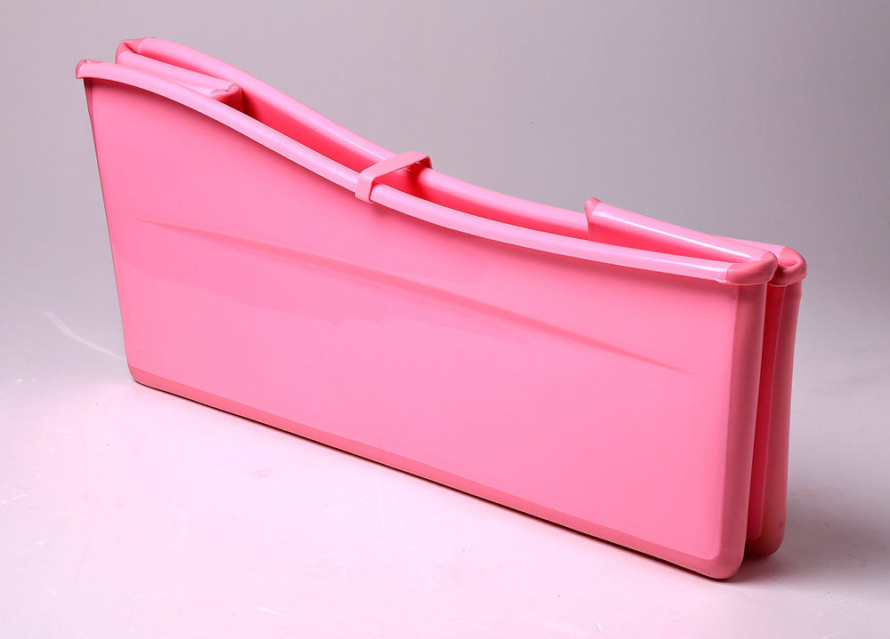 Ganen Baby Bath Tub Portable Pink in use during bath time.