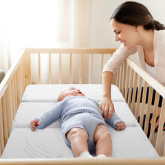Ganondorf dual-sided memory foam mattress supports infants and toddlers with adaptive comfort.