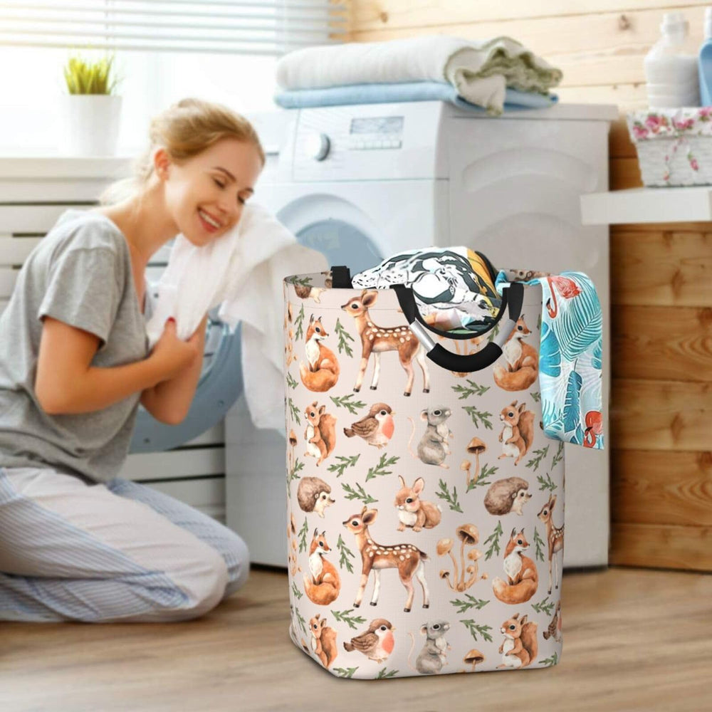 Gbuzozie Forest Little Animals laundry hamper folds flat for compact storage when idle