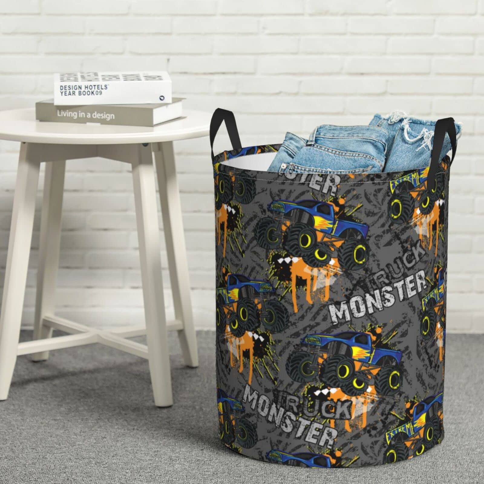 Gbuzozie Monster Trucks round hamper with handles for easy transport.