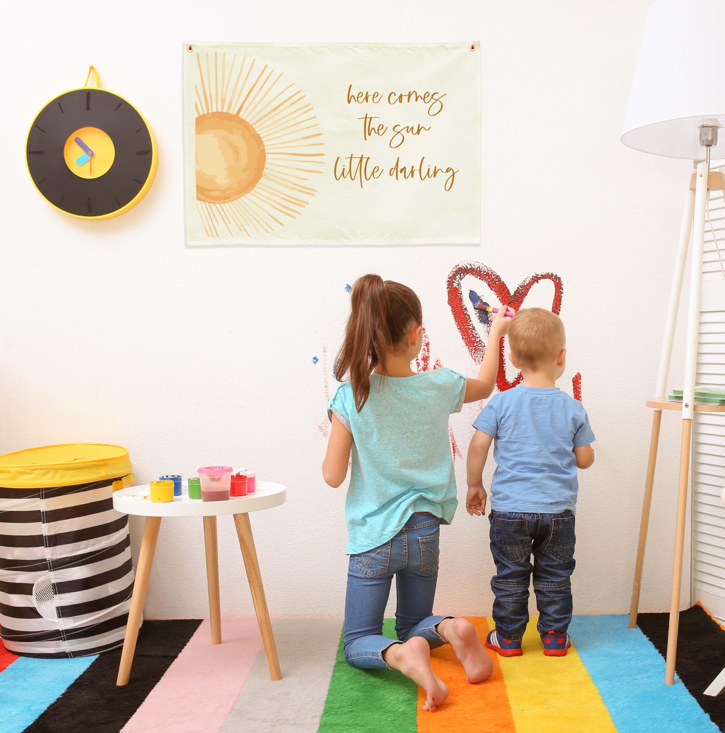 GEANHIL banner displayed above a crib, creating a cozy focal point