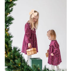Gebelle large fable bow clipped in hair for festive looks.