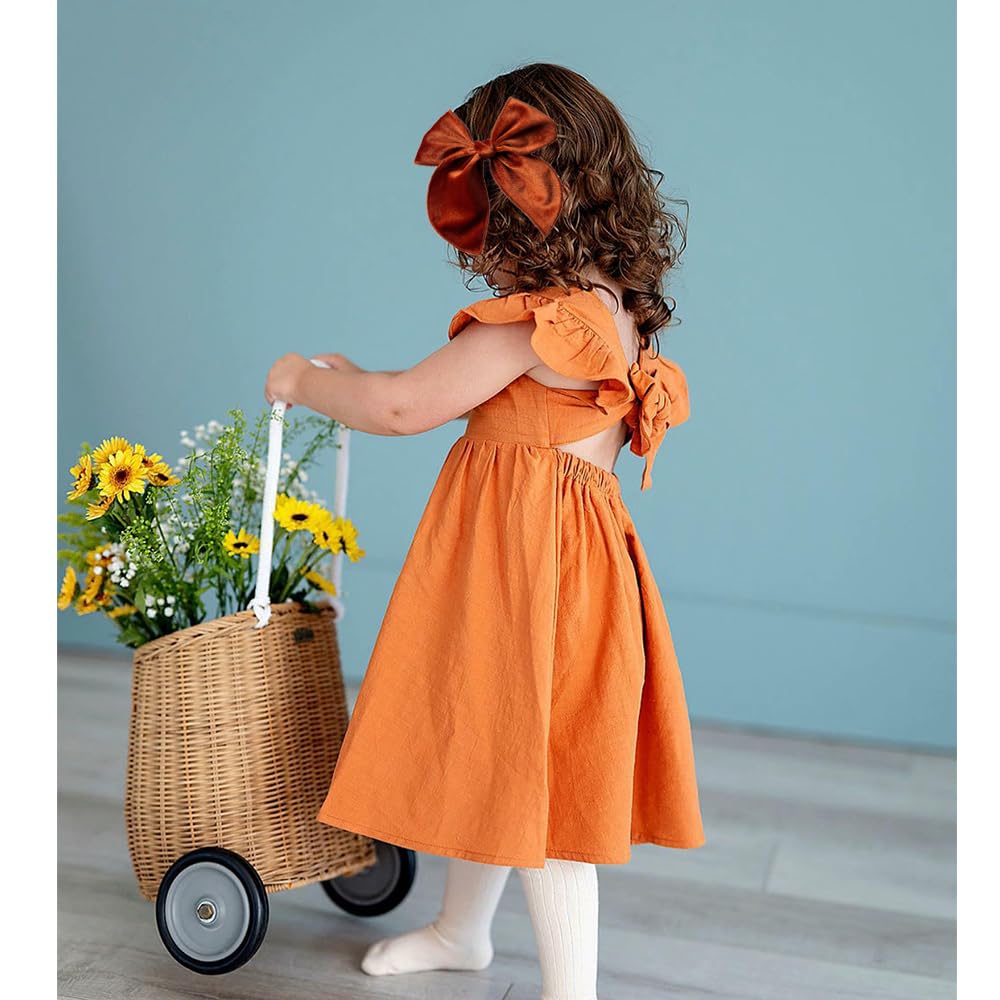 Gebelle neutral shade bow clip suitable for family photos.