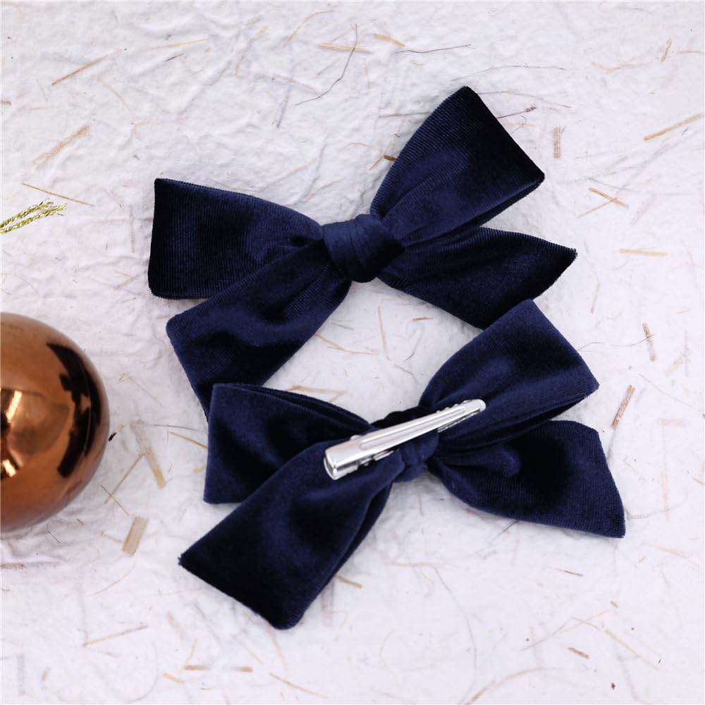 Gebelle Velvet Bow Navy alligator clip attachment provides secure wear.