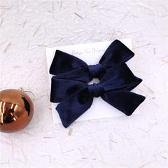 Gebelle Velvet Bow Navy back view shows elegant silhouette from behind.
