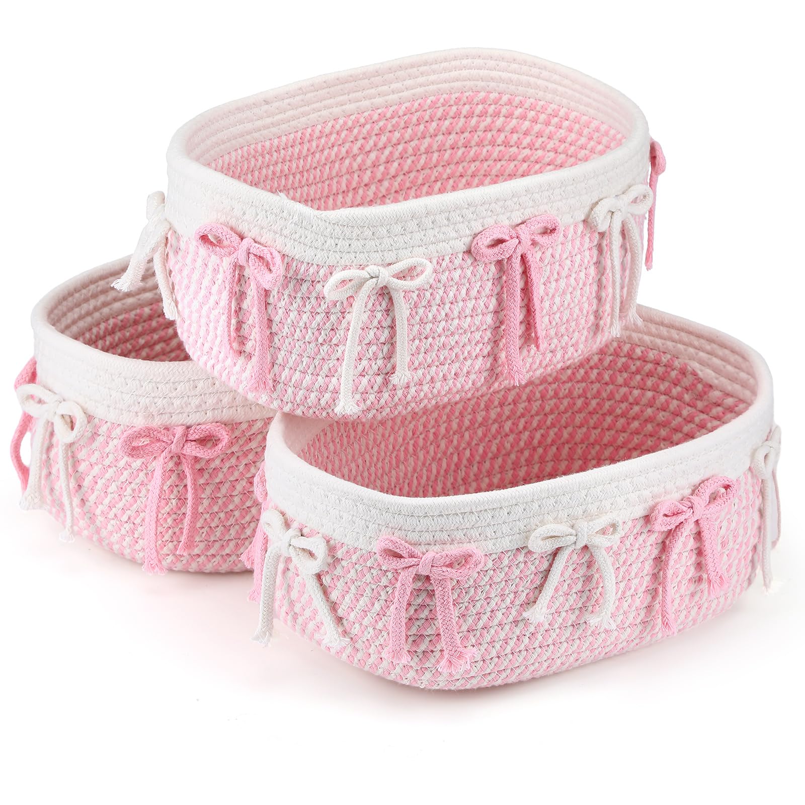 Geelin pink bow basket on desk keeps cosmetics neatly organized