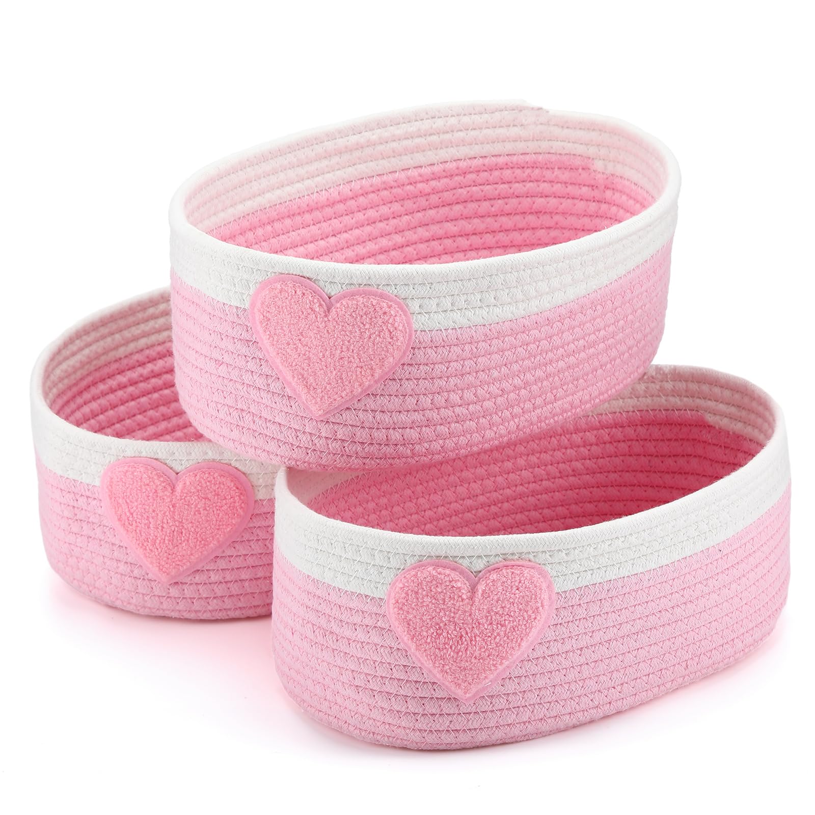 Geelin pink heart baskets collection arranged together for stylish home organization.