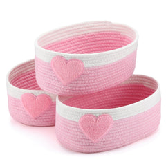 Geelin pink heart baskets collection arranged together for stylish home organization.