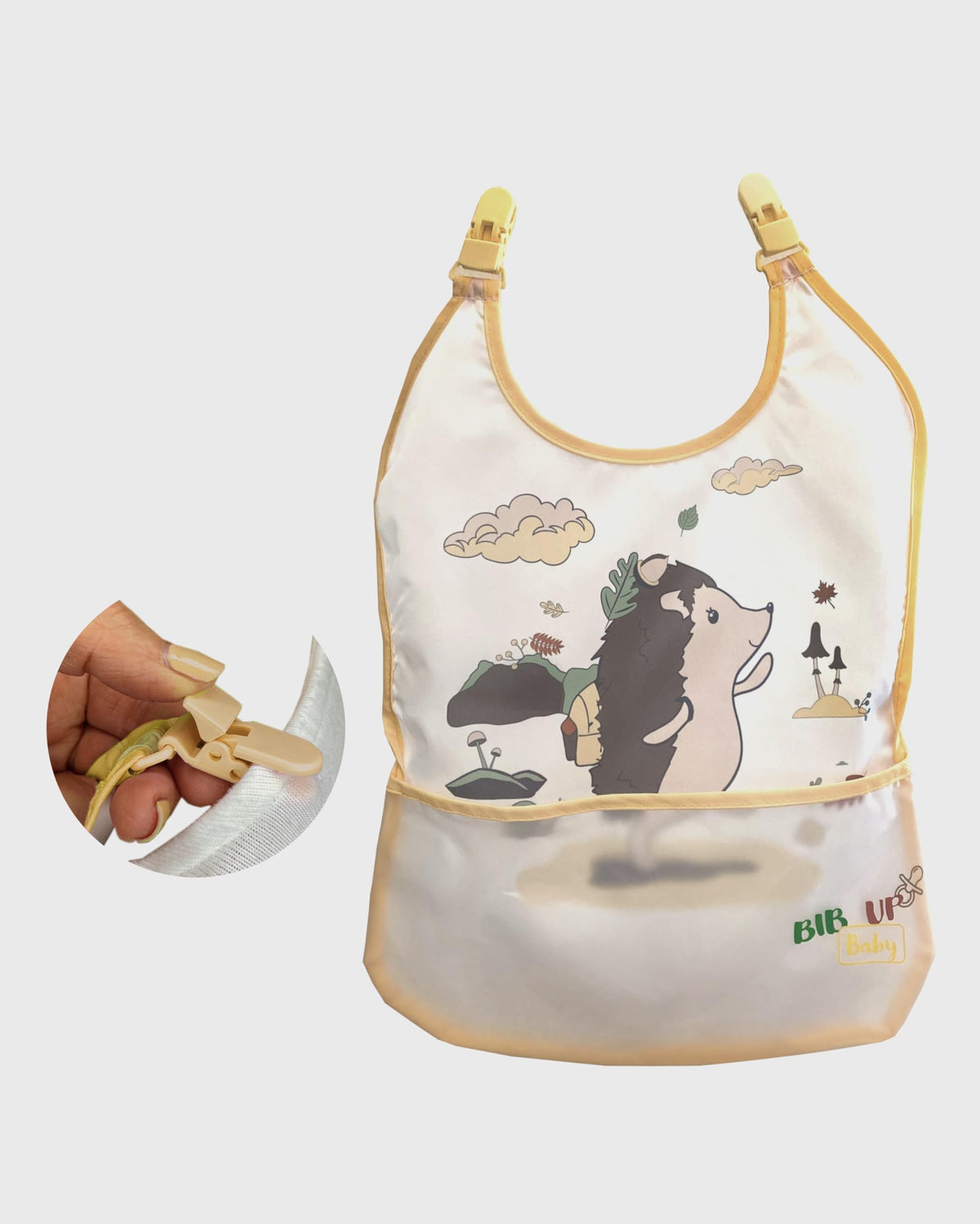 Generic Bib Up Baby clip-attachment secures bib during meals, reducing fuss.