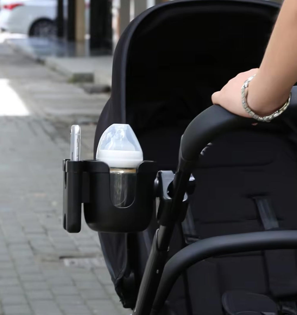 Generic cup holder attachment for bikes and strollers secures cups during rides.