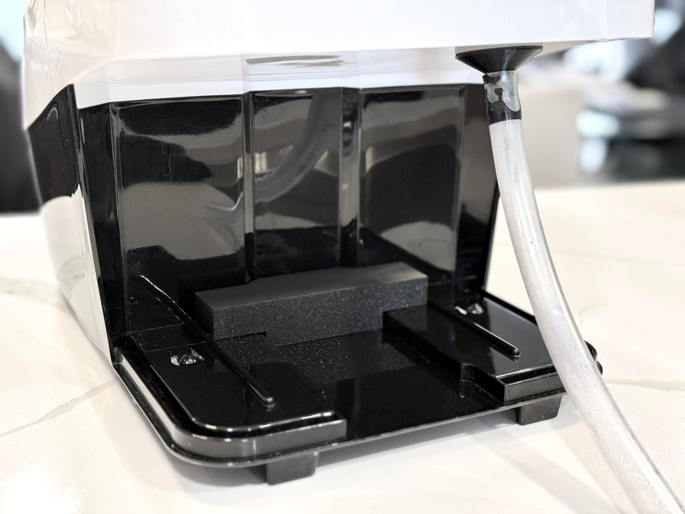Generic Bottle Washer Pro drainage setup shown beside the sink.