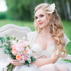 Angel wings motif clip adds vintage glamour to wedding or festival outfits