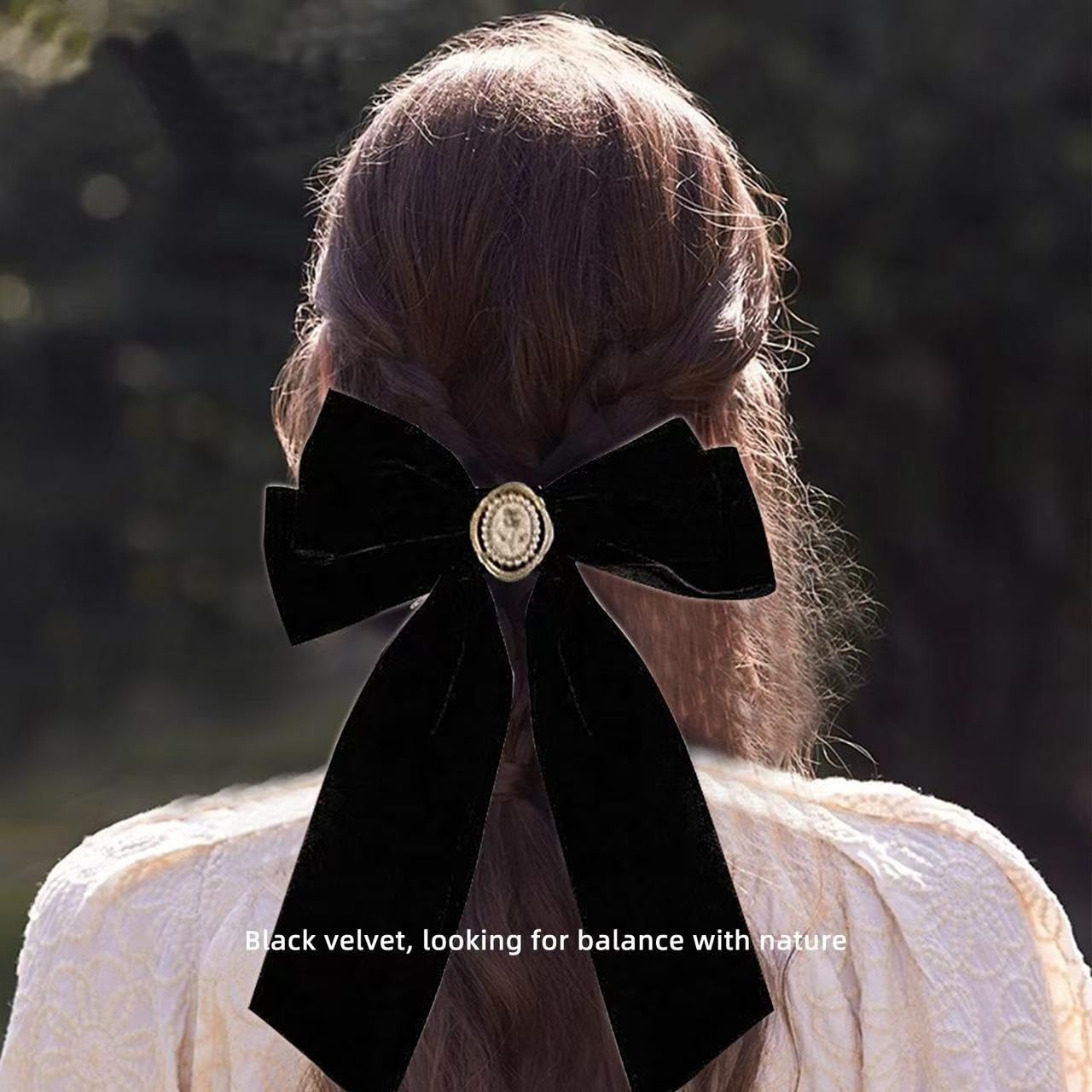 Generic velvet bow detail highlights satin-edged ribbon and secure clip