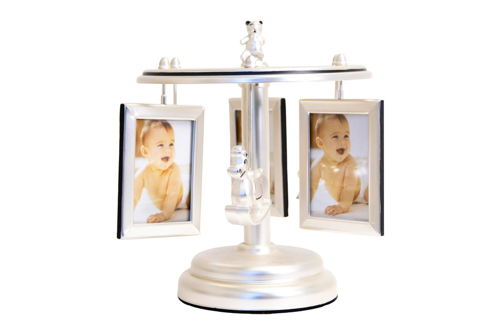 Generic Wind Up Carousel Frame silver slots displaying six 2x3 photos