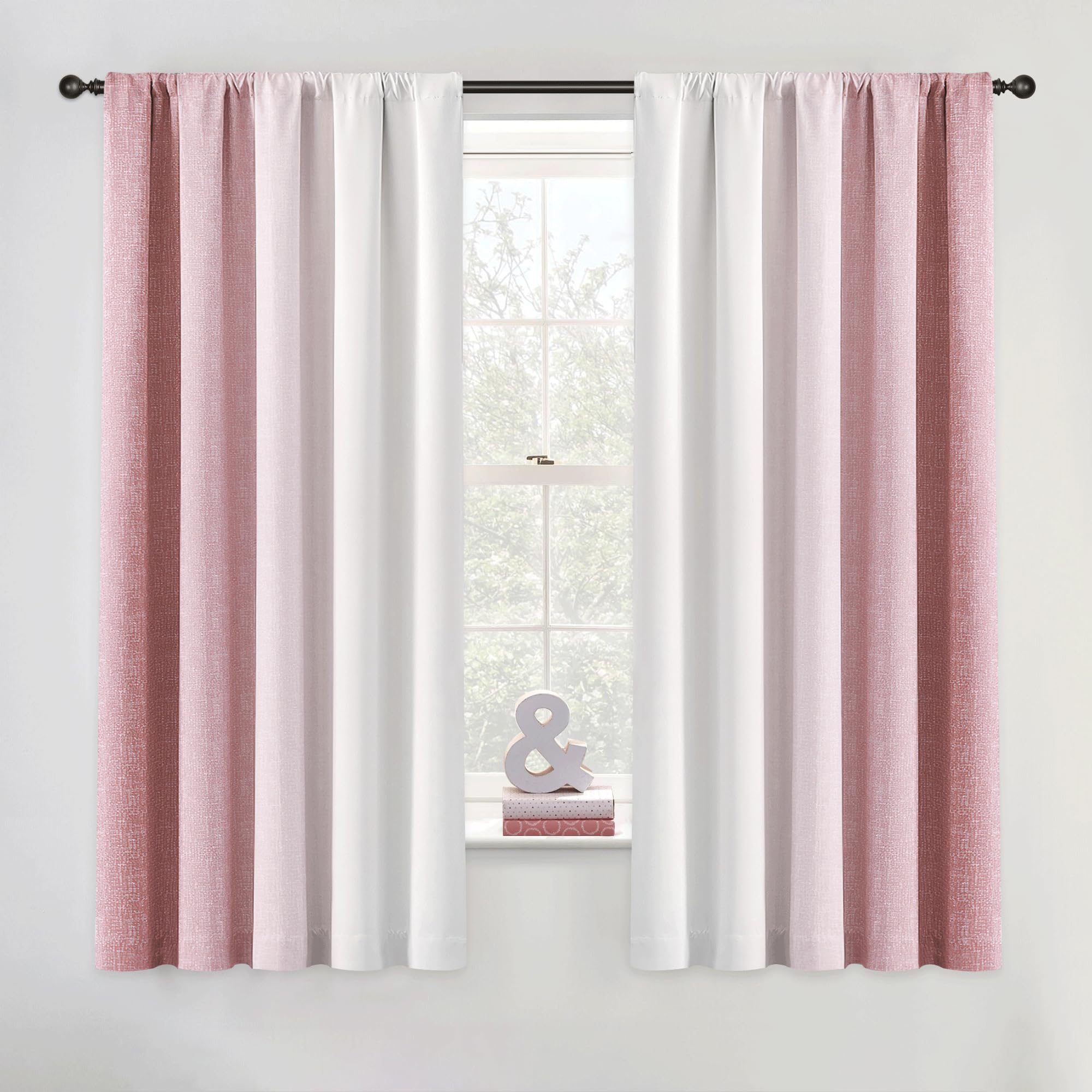 Geomoroccan ombre curtains in pink to white gradient for bedroom ambiance.