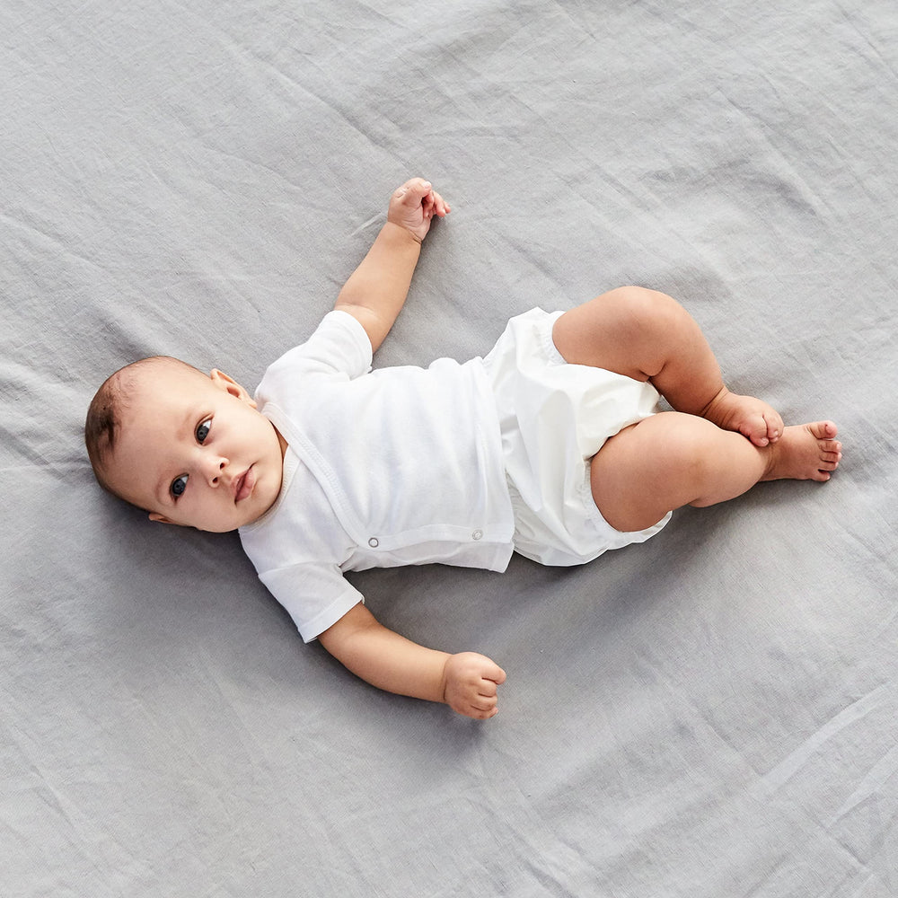 Gerber eight-pack waterproof diaper covers PEVA close-up emphasizing durable waterproof layer.