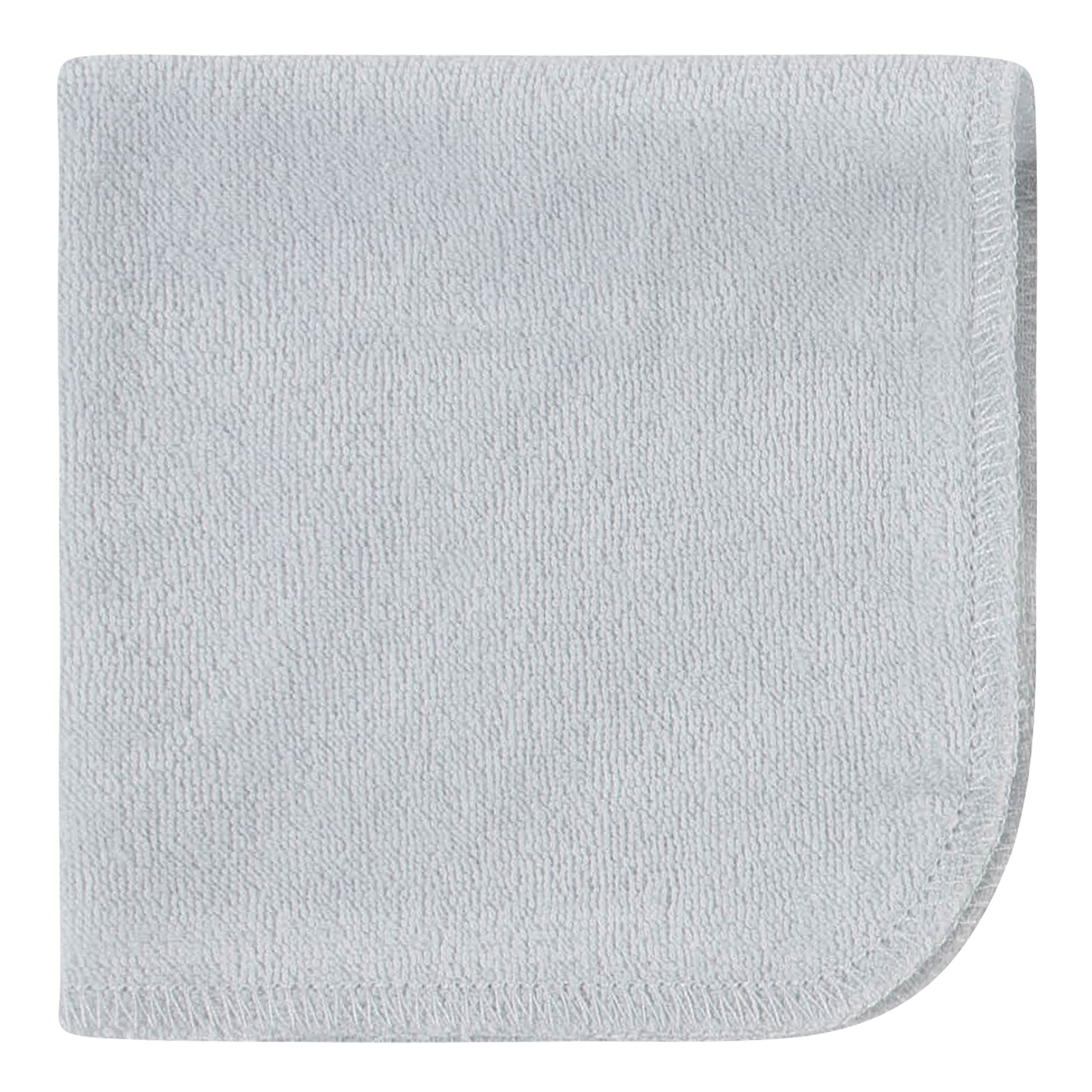Folded bear-green Gerber washcloths ready for bath time prep.