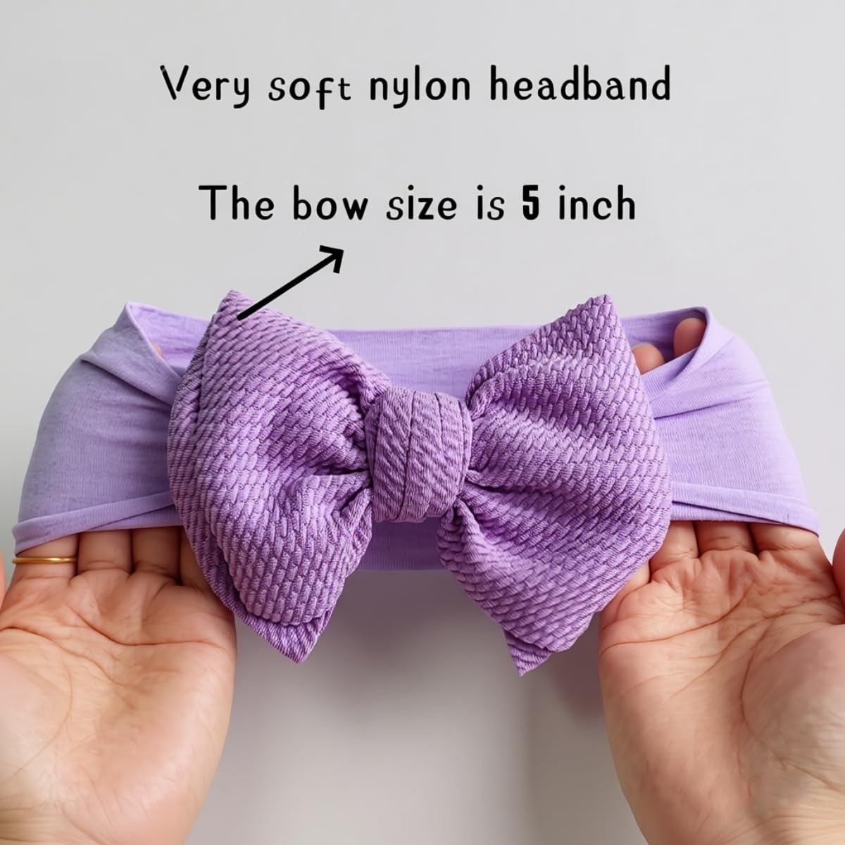 GEZISAN handmade dacron-spandex bow attached to a stretchy nylon band.