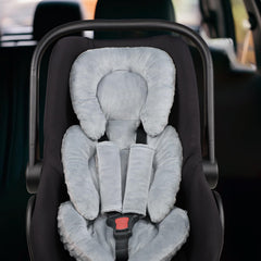 GFU reversible cushion with plush front and 3D back keeps baby cozy.