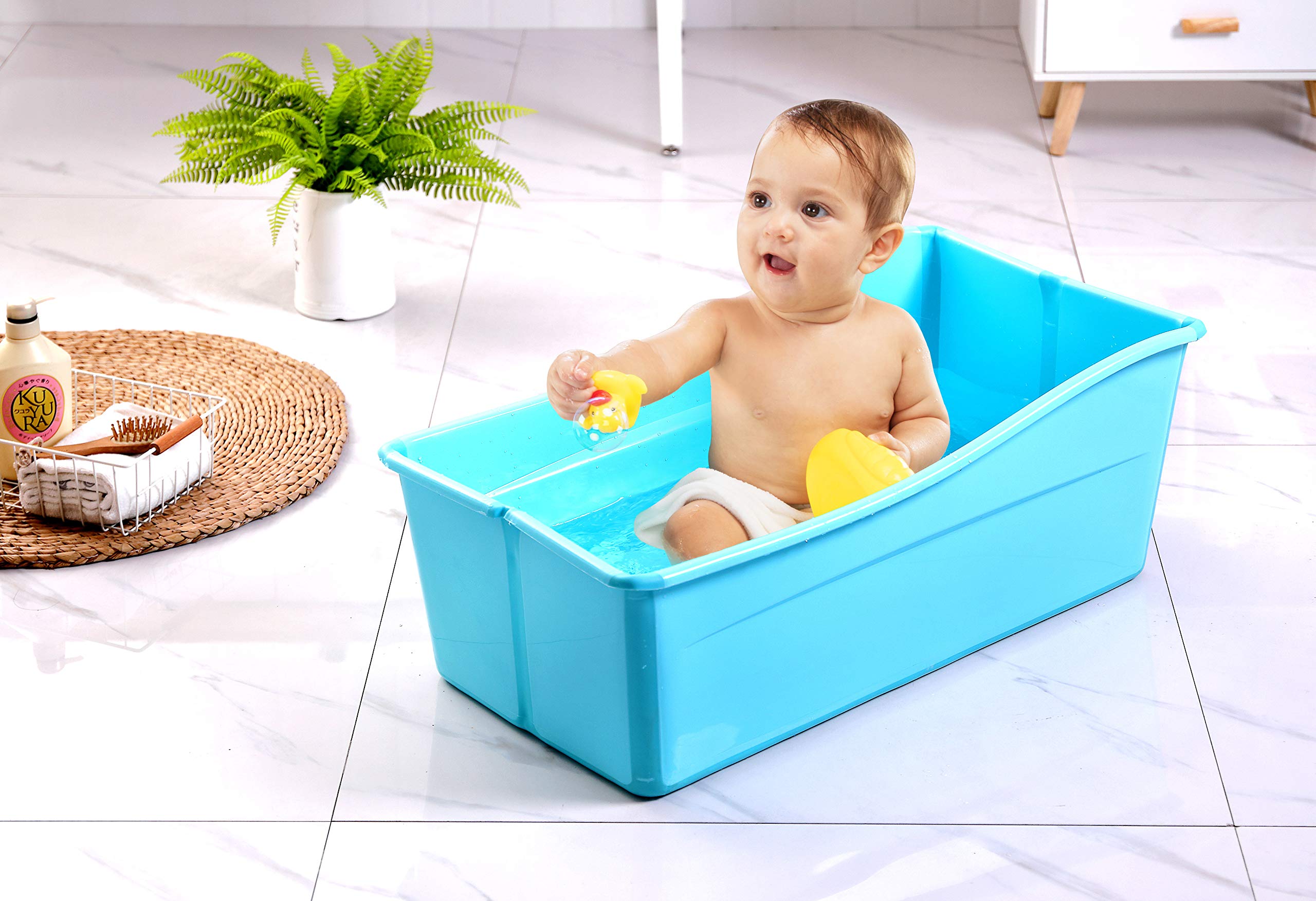 G Ganen blue portable tub in use for ice bath sessions