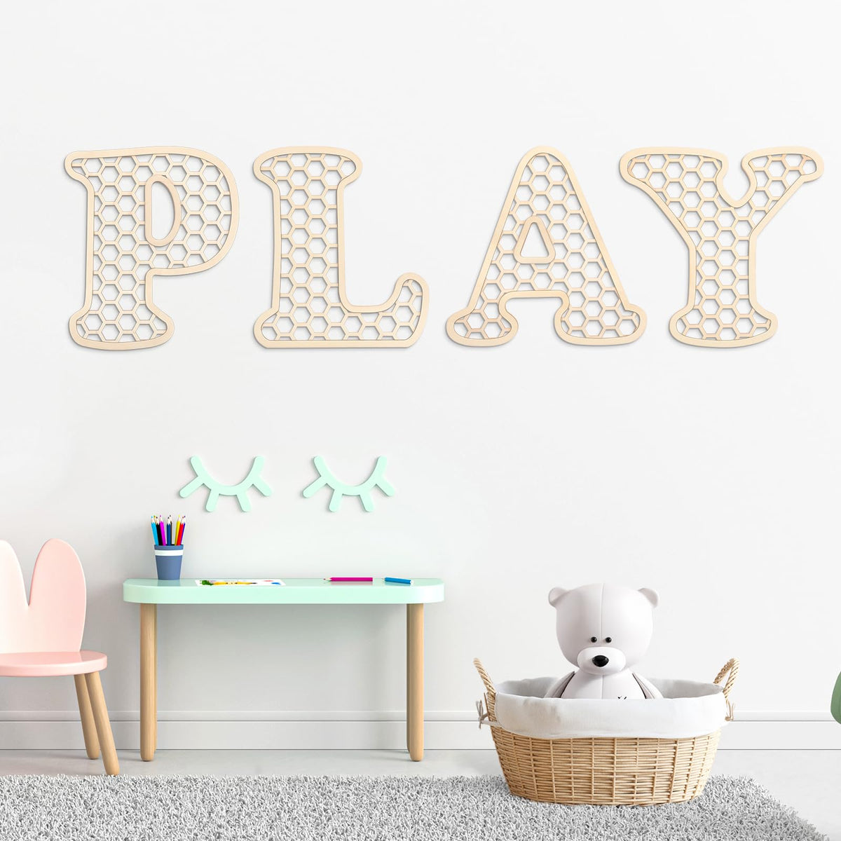 Giantree rattan letters with hexagon frame add boho charm to playroom walls