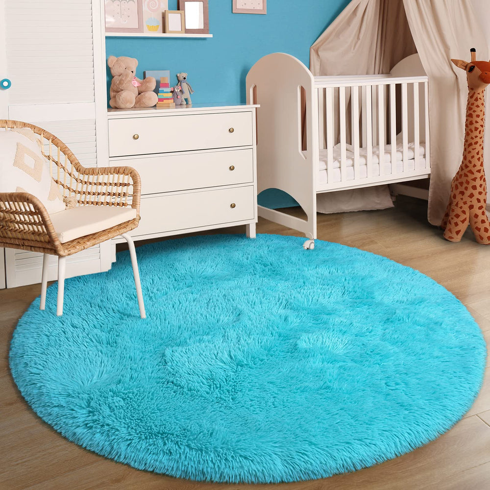 Gifeas blue fluffy round rug emphasizes circular design as decor focal