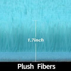 Gifeas blue round rug enhances living room decor with plush texture