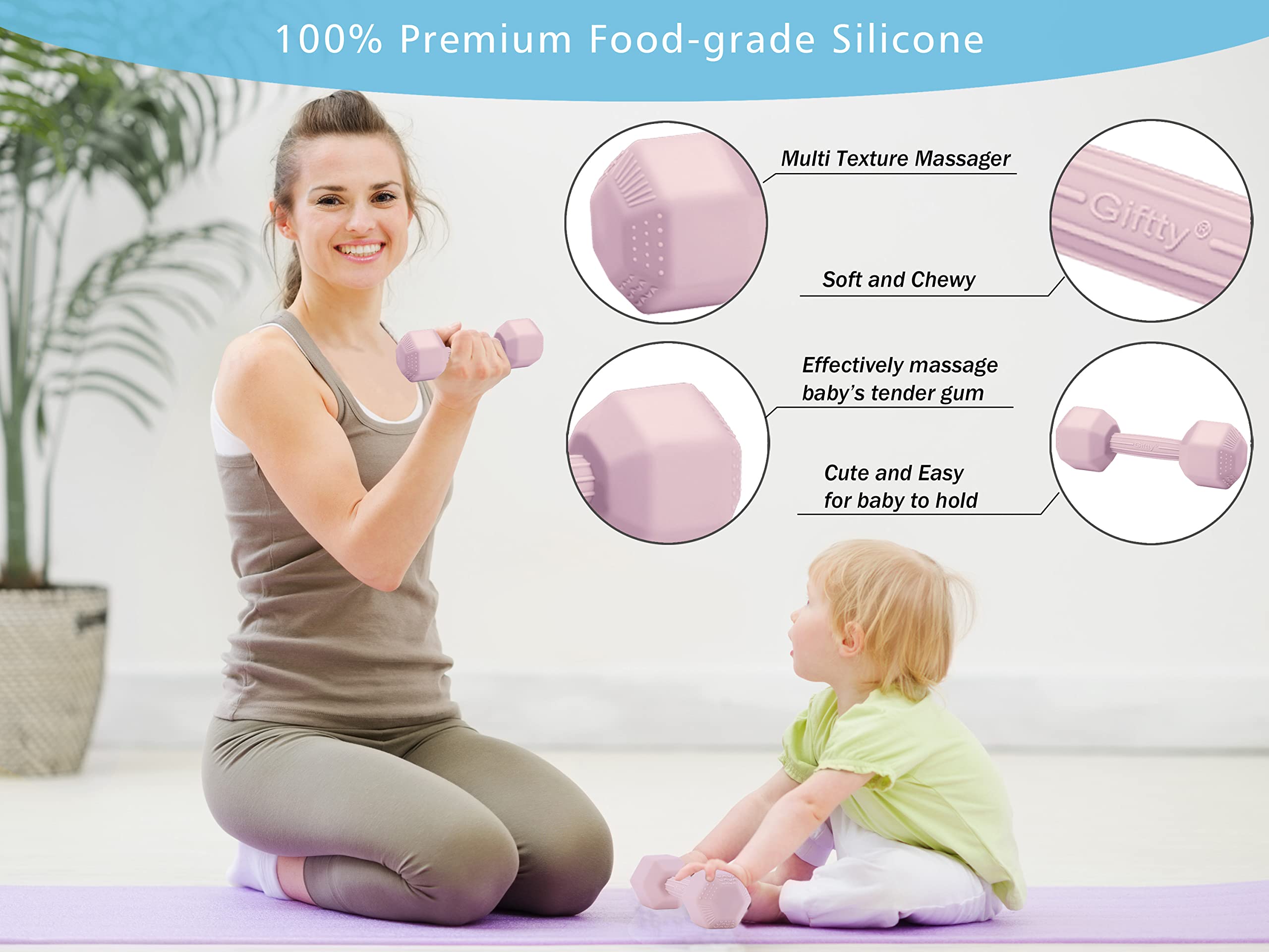 Giftty baby dumbbell pink rattle in use during playtime to stimulate senses.