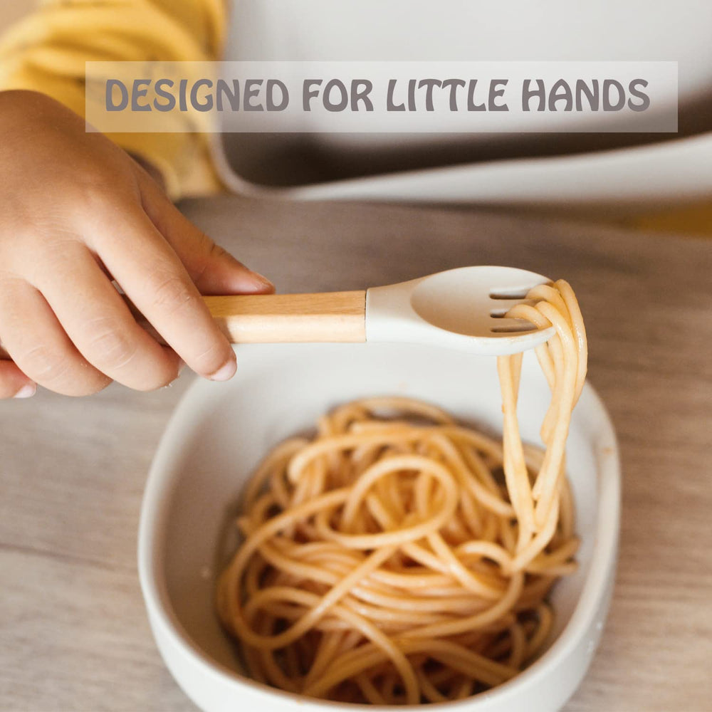 Ginbear ergonomic wood handle aids comfortable parent feeding sessions.