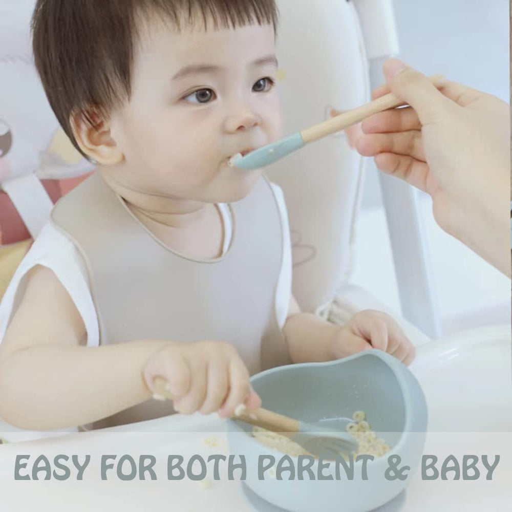 Ginbear teething-friendly utensils soothe gums during meals.