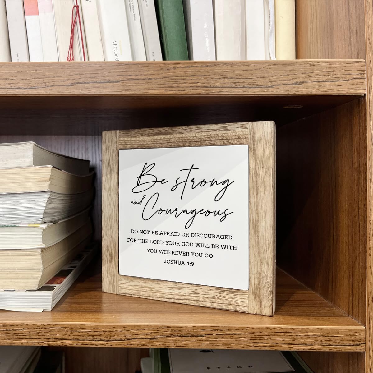 Gkwa Joshua 1:9 sign placed on bookshelf for subtle rustic charm