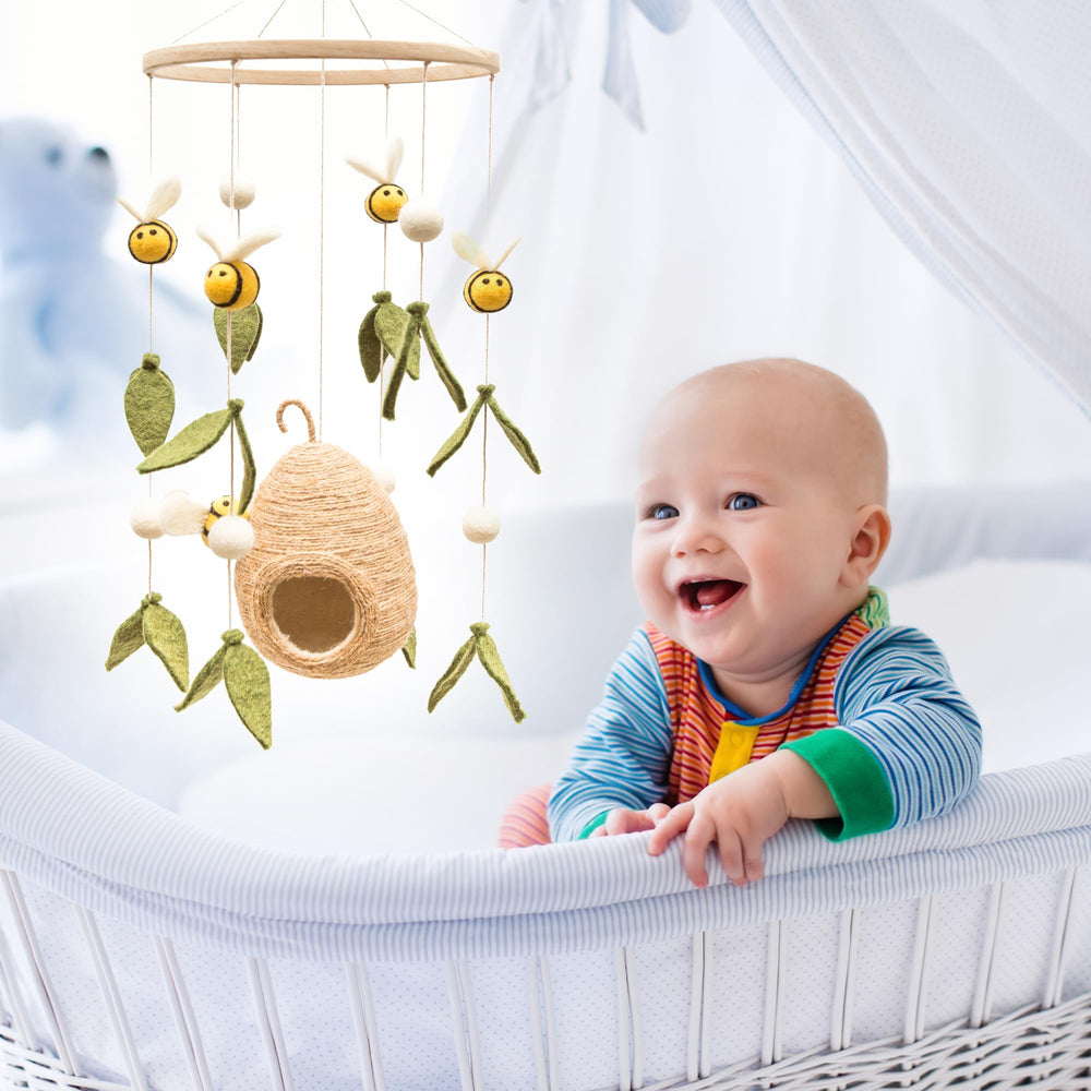 Glaciart One cotton threads and wooden hoop on the mobile for safe nursery decor