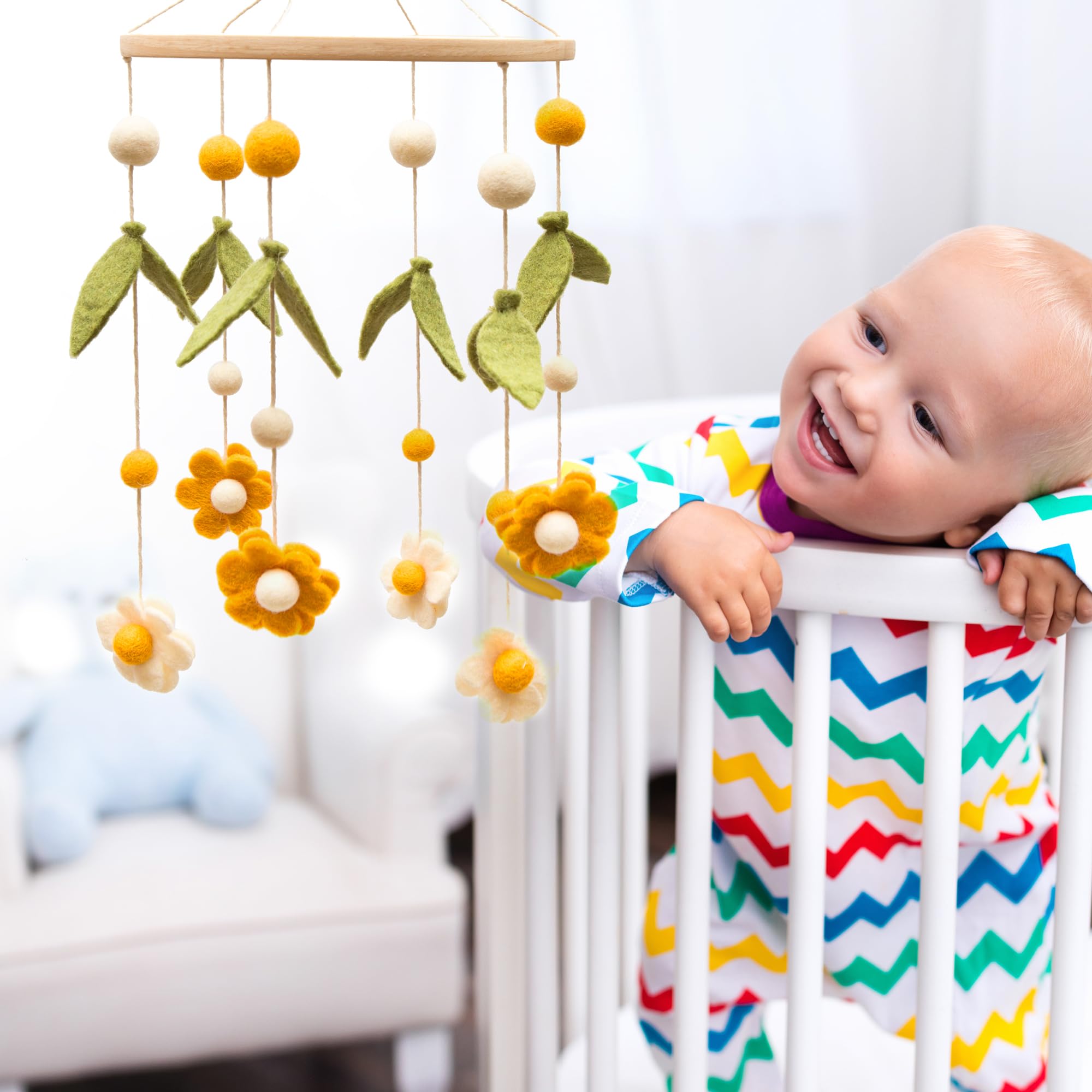Glaciart One daisy wool mobile adds soft, calming nursery decor.