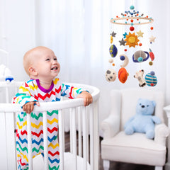 Glaciart One space nursery mobile starry backdrop stimulates bedtime imagination.
