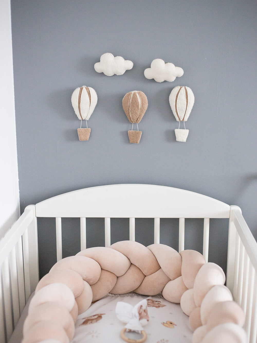Glaciart One wall garland idea enhances ceilings or walls with whimsical color.