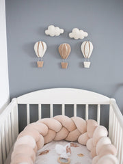Glaciart One wall garland idea enhances ceilings or walls with whimsical color.
