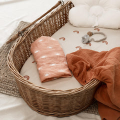 GLLQUEN BABY muslin cotton weave close-up shows breathable fabric for baby comfort.