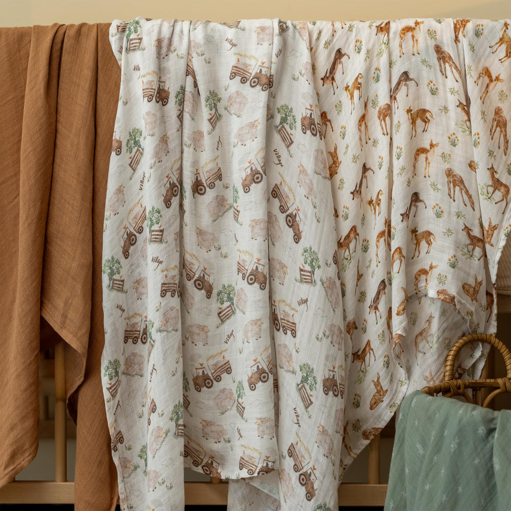 GLLQUEN BABY muslin blankets in multiple colors.