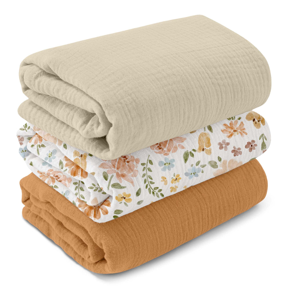 GLLQUEN BABY muslin swaddle blanket in Pastoral Whispers, breathable for gentle baby comfort.
