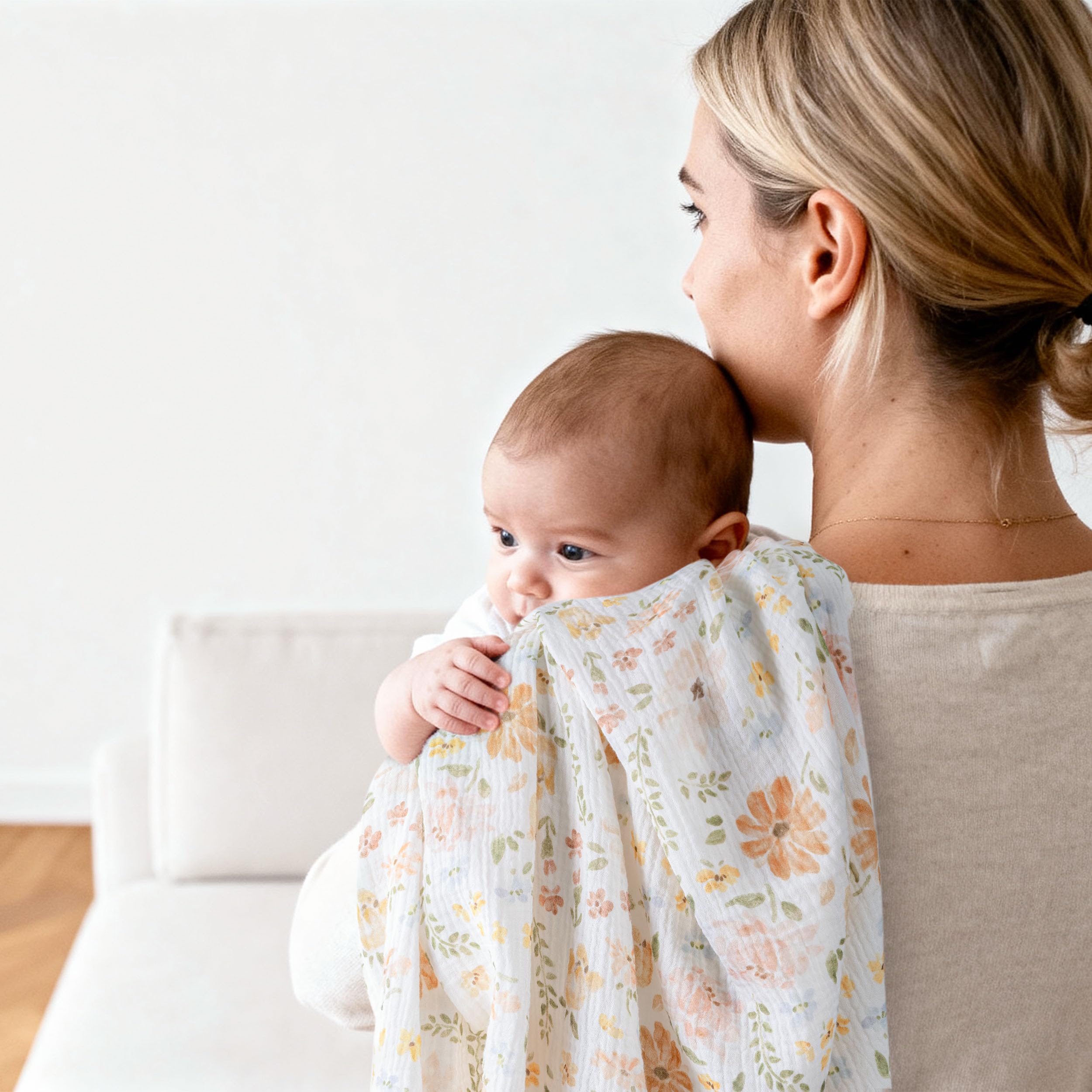 GLLQUEN BABY muslin swaddle texture close-up, showcasing soft cotton weave.