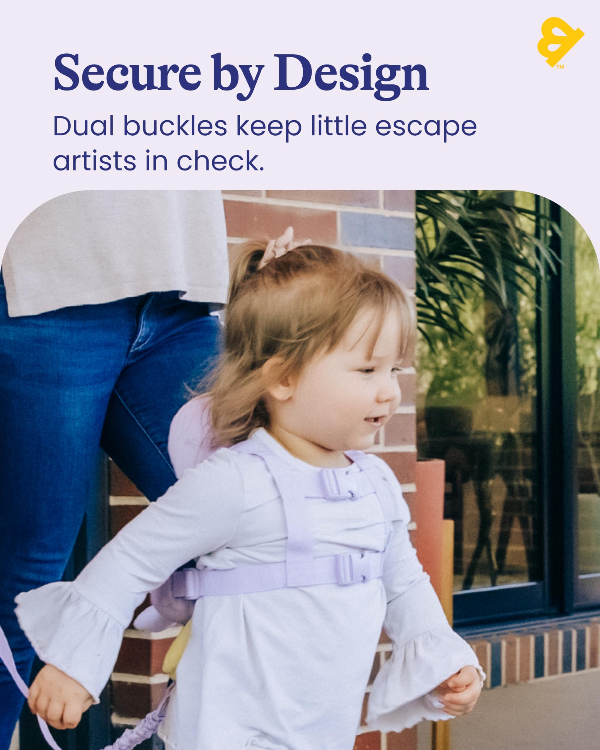 GoldBug harness worn on child demonstrates everyday safety while exploring parks and markets.
