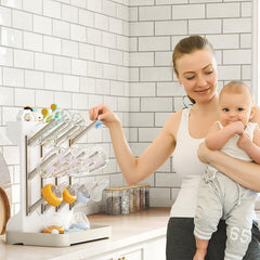 GoMaihe bottle dryer with pacifier tray and brush storage.
