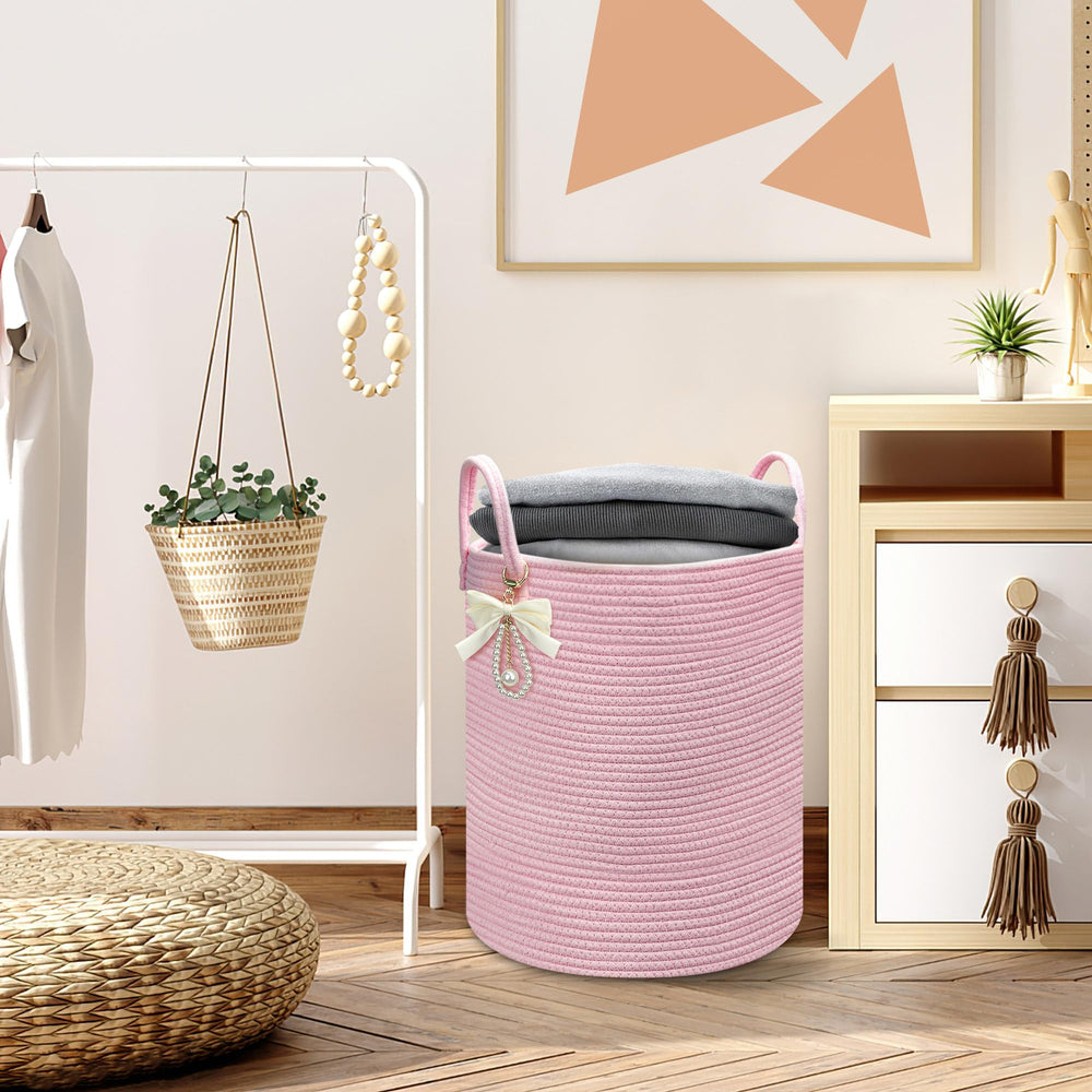 Goodheim pink cotton rope basket complements nursery decor and daily routines.