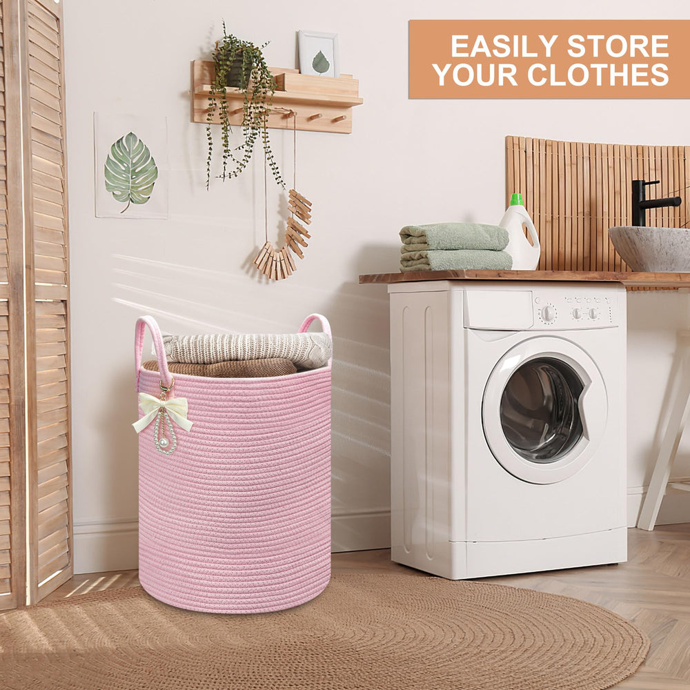 Goodheim laundry hamper pink handles make carrying to laundry simple.