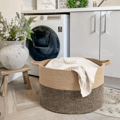 Goodpick round wicker laundry hamper with handles for easy clothing organization.