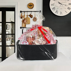 Goodpick rope storage basket in black shown inside a cabinet for tidy storage.